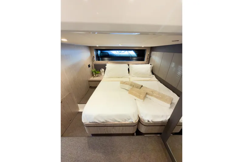 Slide: The Image of Luxurious cabin interior of 2018 Azimut Atlantis 43 yacht with twin beds and modern decor. - 18