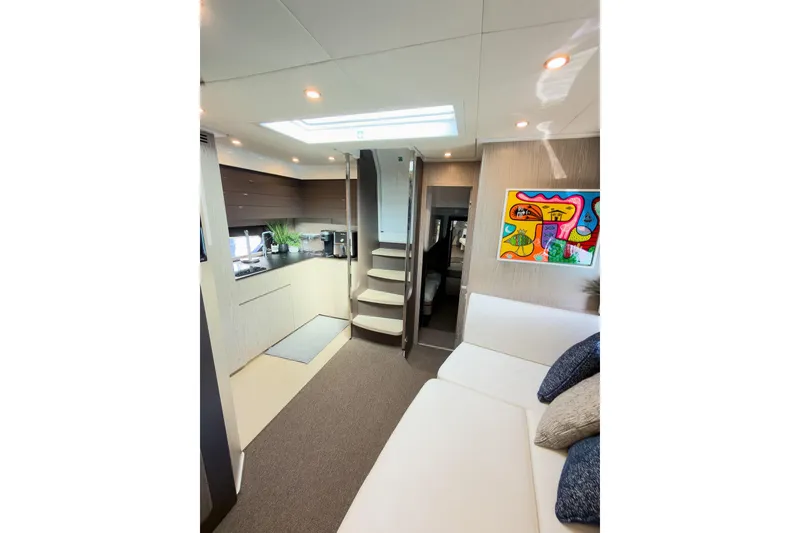 Slide: The Image of Luxurious interior of 2018 Azimut Atlantis 43 yacht with modern decor and vibrant artwork. - 3