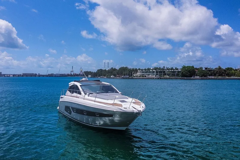 Slide: The Image of Azimut Atlantis 43 yacht from 2018 on clear blue water under a sunny sky. - 7
