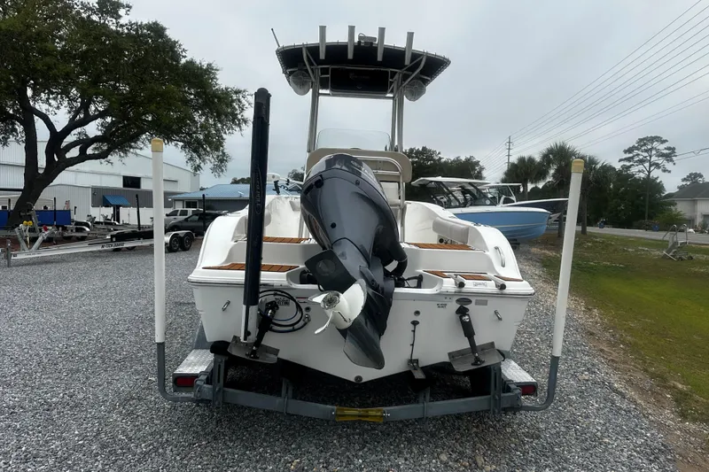 Slide: The Image of 2016 Sea Fox 186 Commander boat on trailer, rear view with outboard motor. - 3
