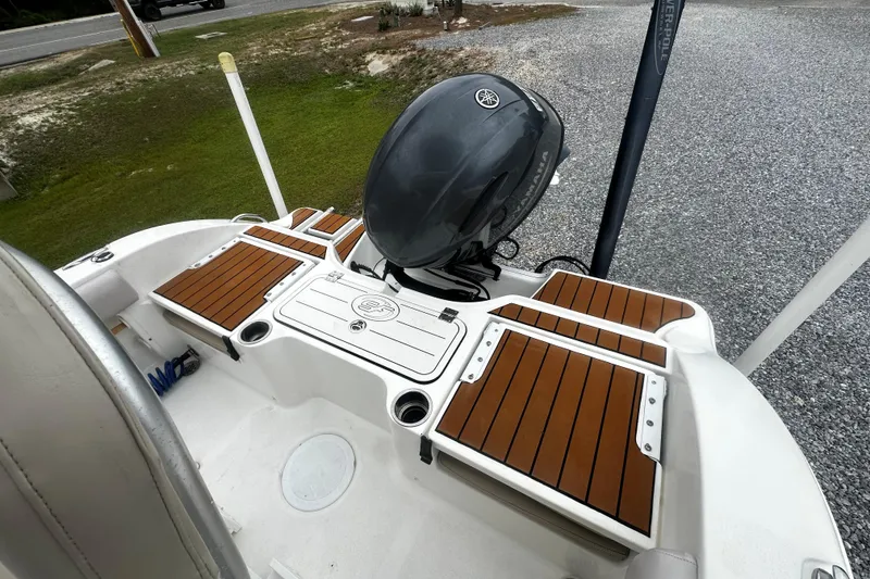 Slide: The Image of 2016 Sea Fox 186 Commander boat with Yamaha outboard motor and teak-style decking. - 7