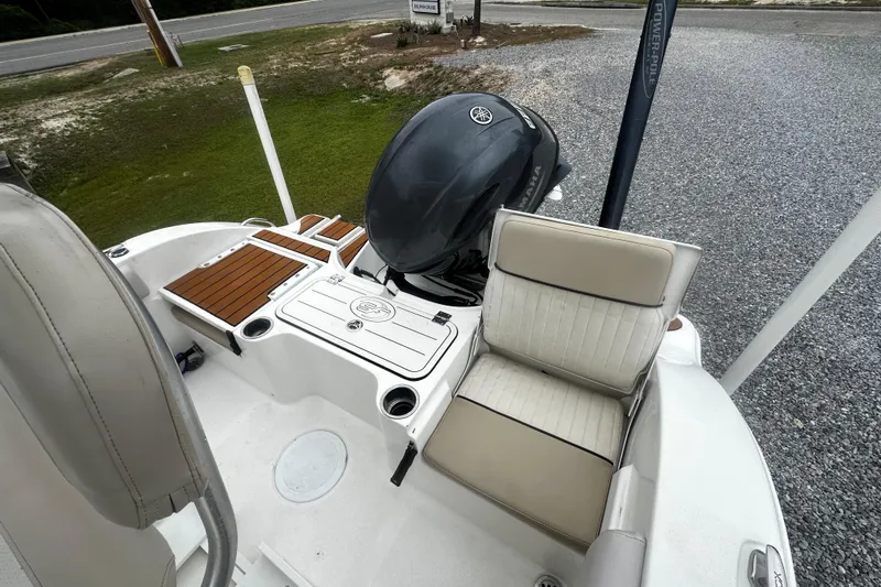 Slide: The Image of 2016 Sea Fox 186 Commander boat interior with Yamaha engine and seating. - 8