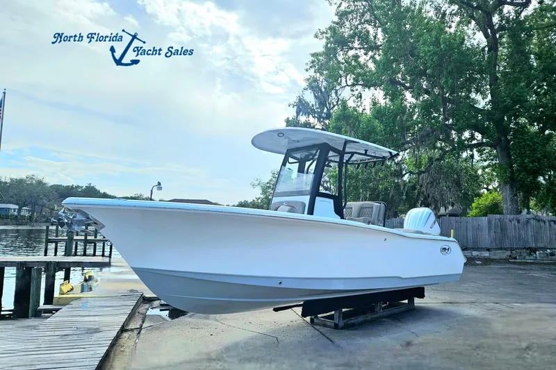 The Image of 2026 Sea Hunt Ultra 245 SE boat at North Florida Yacht Sales dock. - 0