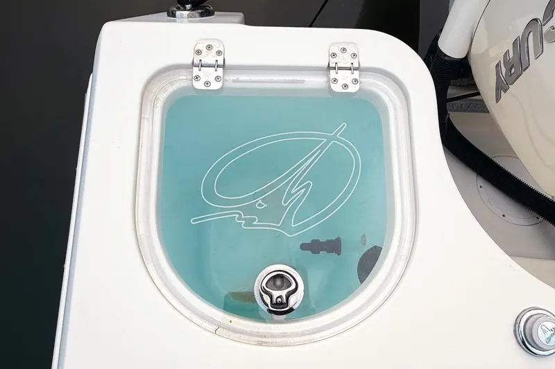 Slide: The Image of Livewell on 2016 Sailfish 290 CC boat with clear lid and logo. - 12
