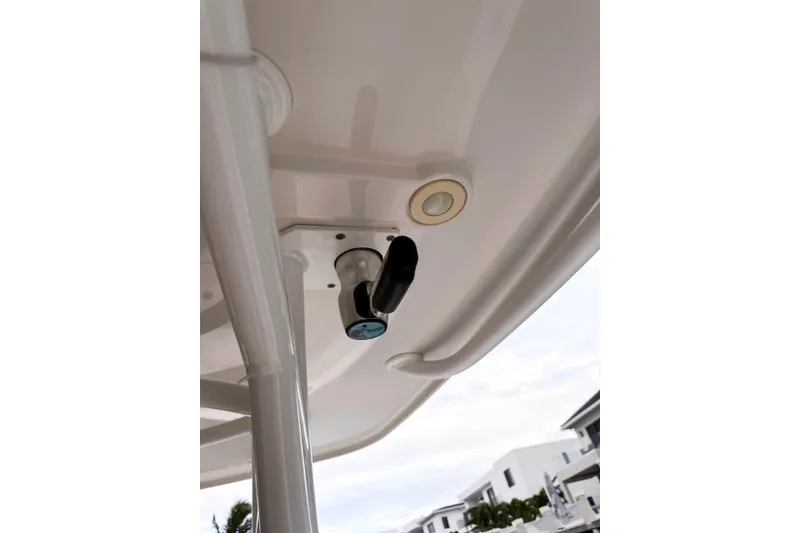 Slide: The Image of Close-up of a 2016 Sailfish 290 CC boat's ceiling fixture and light. - 23