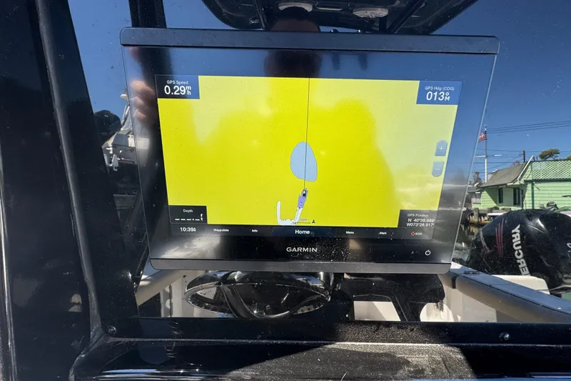 Slide: The Image of Garmin GPS display on 2022 Tidewater 256 CC Adventure boat dashboard. - 9