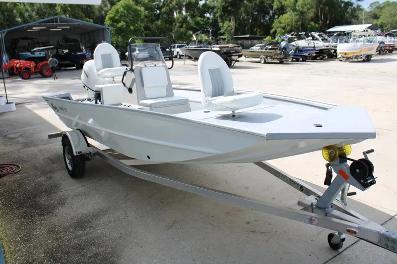 The Image of The image shows a 2026 G3 Bay 17 boat on a trailer in an outdoor storage area. - 0