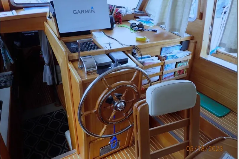 Slide: The Image of Interior helm of 2001 Nauticat Staysail Ketch with Garmin navigation system. - 5