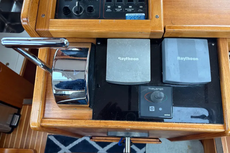 Slide: The Image of Control panel of a 2001 Nauticat Staysail Ketch with Raytheon equipment and thruster joystick. - 7