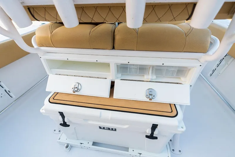 Slide: The Image of Manufacturer Provided Image: 2025 Sportsman Open 212 Center Console boat seating and storage compartments. - 28