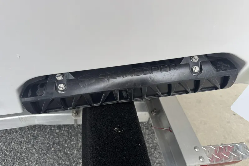 Slide: The Image of Seakeeper component on 2026 Sportsman Open 212 Center Console boat, close-up view. - 5