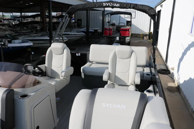 Slide: The Image of 2026 Sylvan Mirage 820 CLZ DH Premium Pontoon with luxurious seating and sleek design. - 14