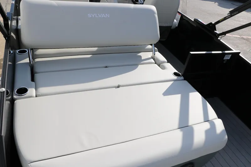 Slide: The Image of 2026 Sylvan Mirage 820 CLZ DH Premium Pontoon with luxurious seating and cup holders. - 15