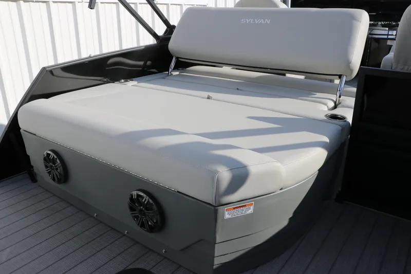 Slide: The Image of 2026 Sylvan Mirage 820 CLZ DH Premium Pontoon with luxurious seating and integrated speakers. - 16