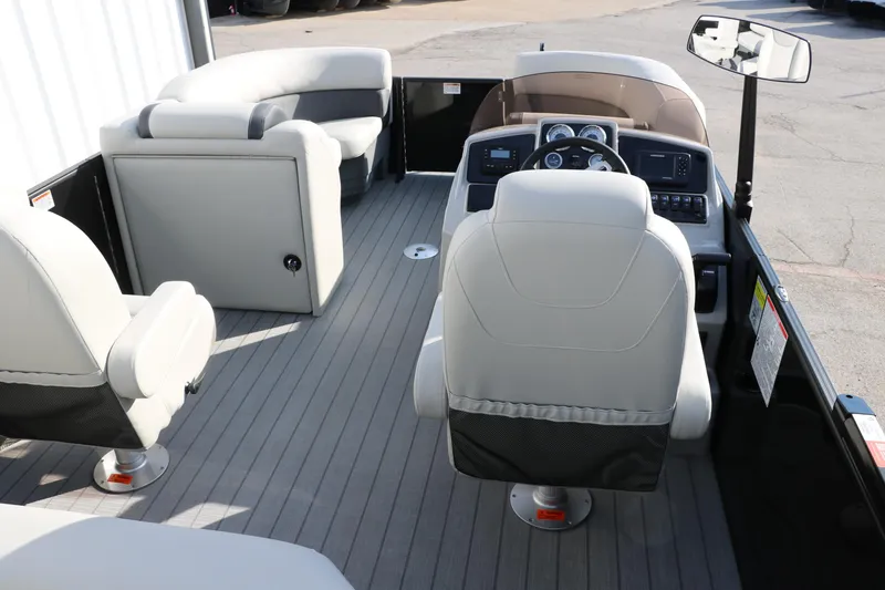 Slide: The Image of 2026 Sylvan Mirage 820 CLZ DH Premium Pontoon interior with modern seating and helm. - 18