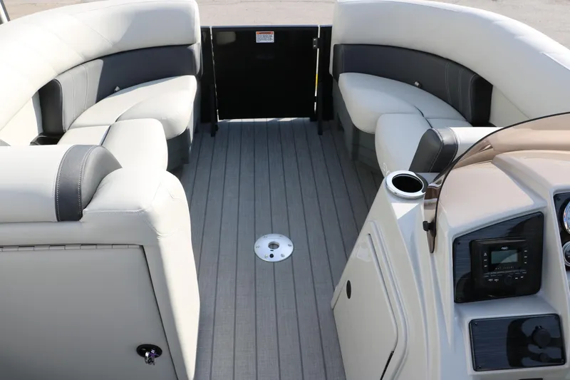 Slide: The Image of Interior of 2026 Sylvan Mirage 820 CLZ DH Premium Pontoon with plush seating and modern dashboard. - 20