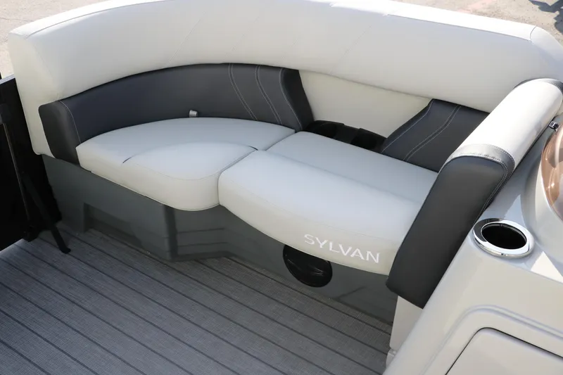 Slide: The Image of 2026 Sylvan Mirage 820 CLZ DH Premium Pontoon seating with sleek design and cup holder. - 22