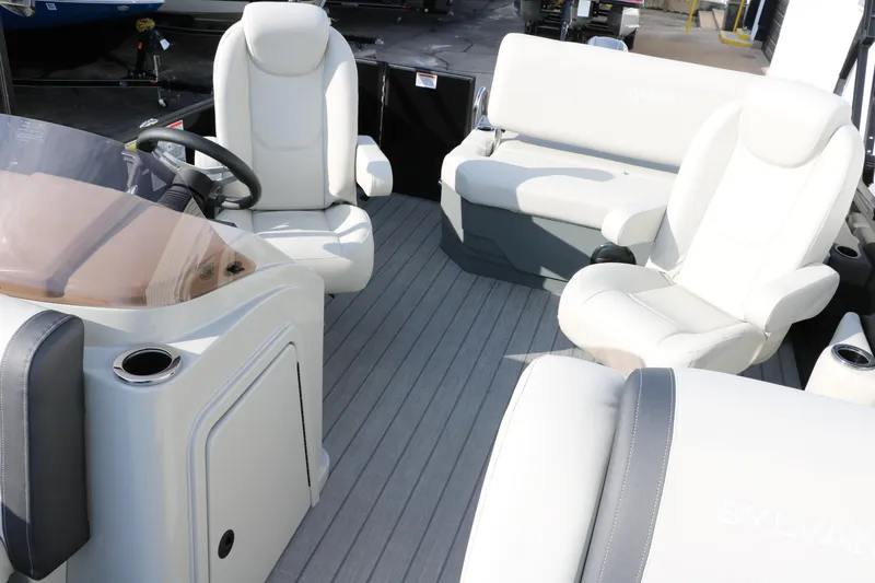 Slide: The Image of Luxurious interior of 2026 Sylvan Mirage 820 CLZ DH Premium Pontoon with plush seating. - 26