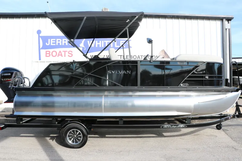 Slide: The Image of 2026 Sylvan Mirage 820 CLZ DH Premium Pontoon boat on trailer, side view. - 34