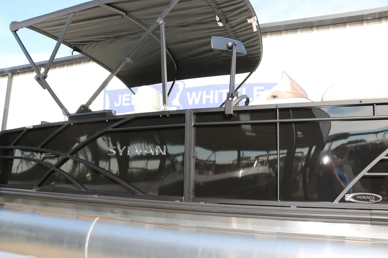 Slide: The Image of 2026 Sylvan Mirage 820 CLZ DH Premium Pontoon with sleek black exterior and canopy. - 9
