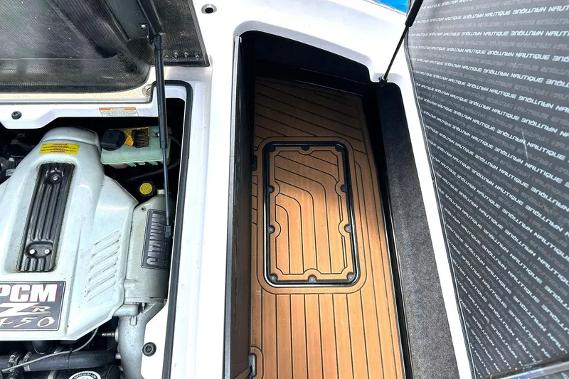 Slide: The Image of Engine compartment of 2013 Nautique Super Air Nautique G23 with PCM ZR 450 engine. - 29