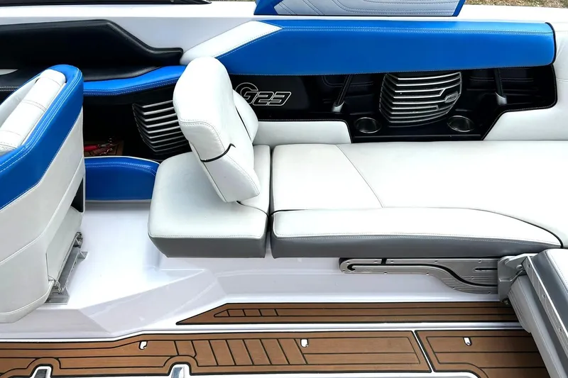 Slide: The Image of Interior seating of 2013 Nautique Super Air Nautique G23 with blue and white upholstery. - 32