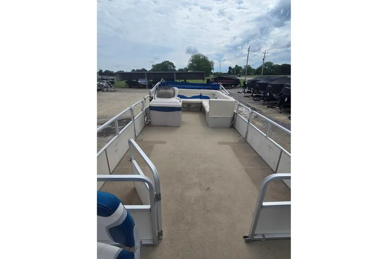 Slide: The Image of 2003 Sun Tracker Party Barge 24 pontoon boat with spacious deck and seating. - 6