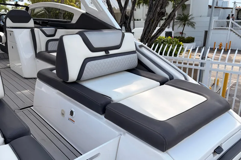 Slide: The Image of 2021 Yamaha Boats 275SD interior with luxurious seating and modern design. - 10
