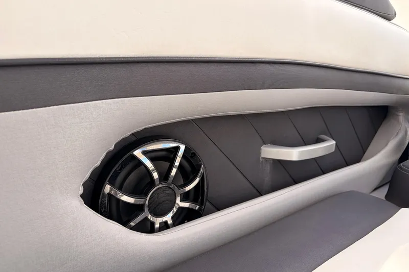 Slide: The Image of Interior speaker and handle detail of 2021 Yamaha Boats 275SD. - 15