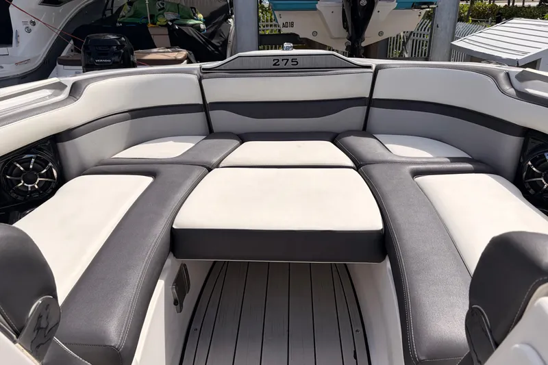 Slide: The Image of 2021 Yamaha Boats 275SD interior with spacious seating and modern design. - 32