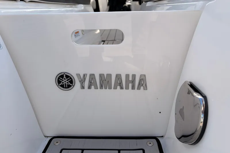 Slide: The Image of 2021 Yamaha Boats 275SD, featuring sleek design and Yamaha logo on the hull. - 38