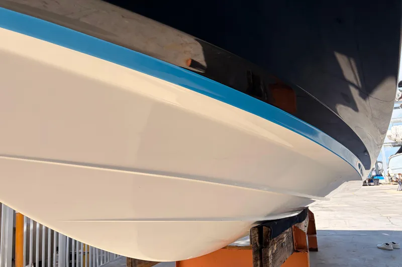 Slide: The Image of 2021 Yamaha Boats 275SD hull on dry dock, showcasing sleek design and craftsmanship. - 48
