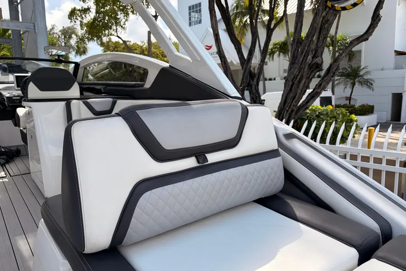 Slide: The Image of 2021 Yamaha Boats 275SD interior with luxurious seating and modern design. - 6