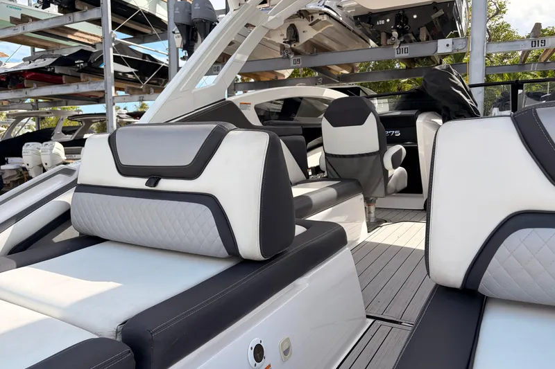Slide: The Image of 2021 Yamaha Boats 275SD interior with luxurious seating and modern design. - 7