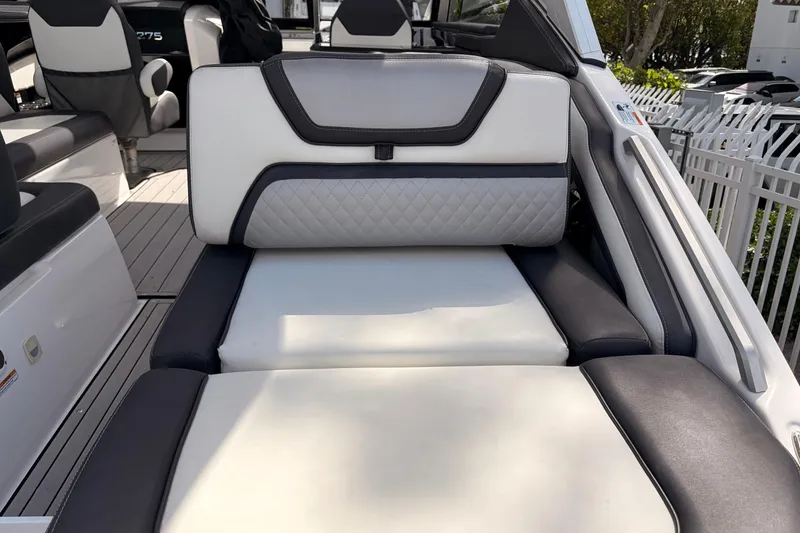 Slide: The Image of 2021 Yamaha Boats 275SD interior with luxurious seating and modern design. - 9