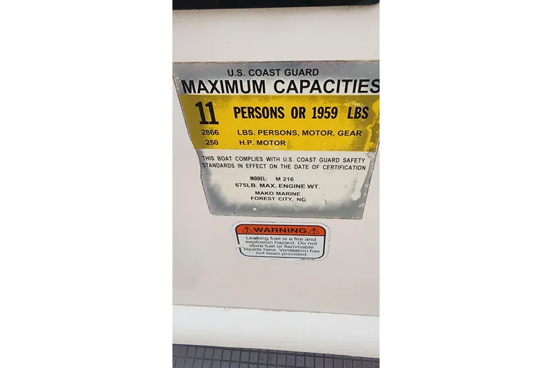 Slide: The Image of U.S. Coast Guard capacity label for 2006 Mako 216 Dual Console boat, 11 persons or 1959 lbs. - 14
