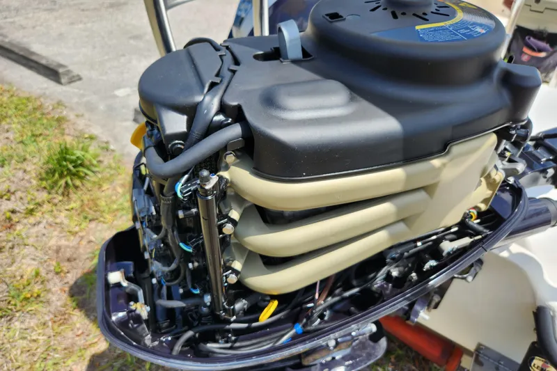 Slide: The Image of 2020 Spear Boatworks Evergladez engine close-up, showcasing intricate mechanical components. - 22