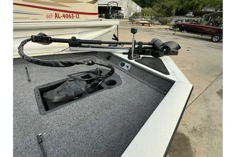 Slide: The Image of 2024 Tracker Pro Team 190 TX boat with trolling motor on deck. - 5