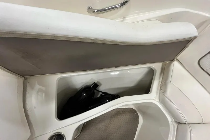 Slide: The Image of Interior storage compartment of a 2012 Sea Ray SLX 230 boat. - 24