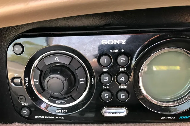 Slide: The Image of Sony marine stereo system in a 2012 Sea Ray SLX 230 boat dashboard. - 8