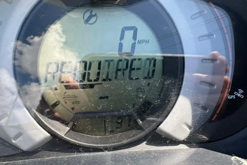 Slide: The Image of Dashboard of 2012 Sea-Doo GTI SE 130 showing maintenance required alert. - 4