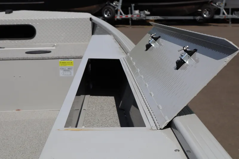 Slide: The Image of Open storage compartment on 2026 Smoker Craft Sportsman 1866 boat. - 11