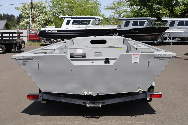 Slide: The Image of 2026 Smoker Craft Sportsman 1866 boat on trailer, parked outdoors. - 4