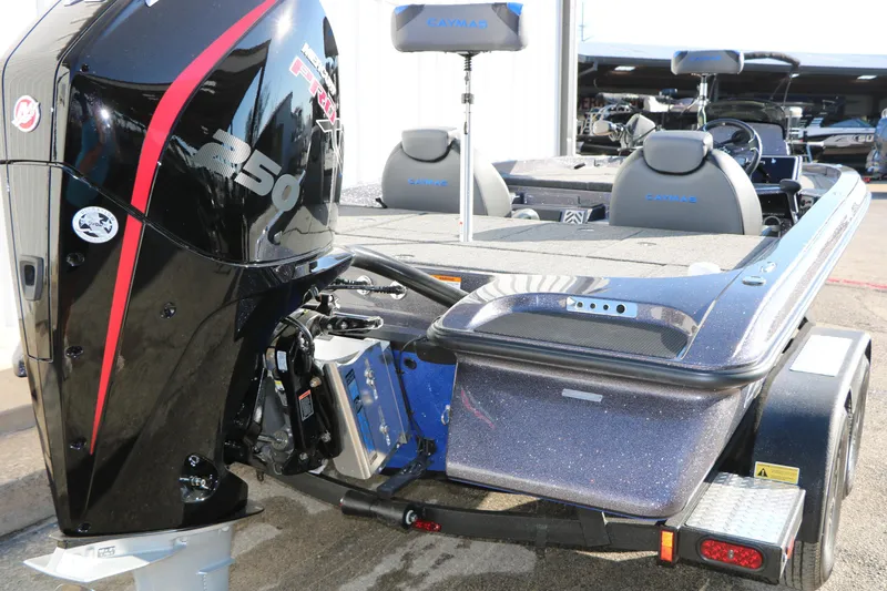 Slide: The Image of 2027 Caymas 201 Pro boat with powerful 250 HP engine, sleek design, and modern features. - 11
