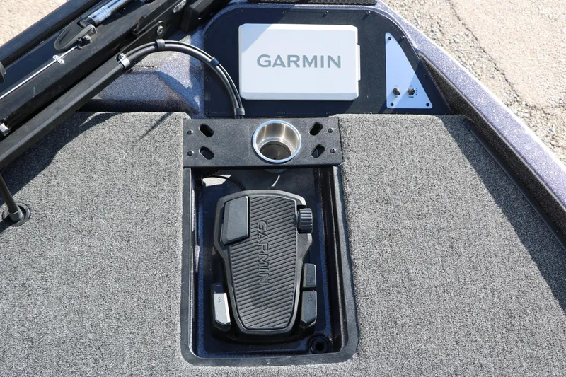 Slide: The Image of Caymas 201 Pro 2027 boat deck with Garmin equipment and foot pedal. - 28