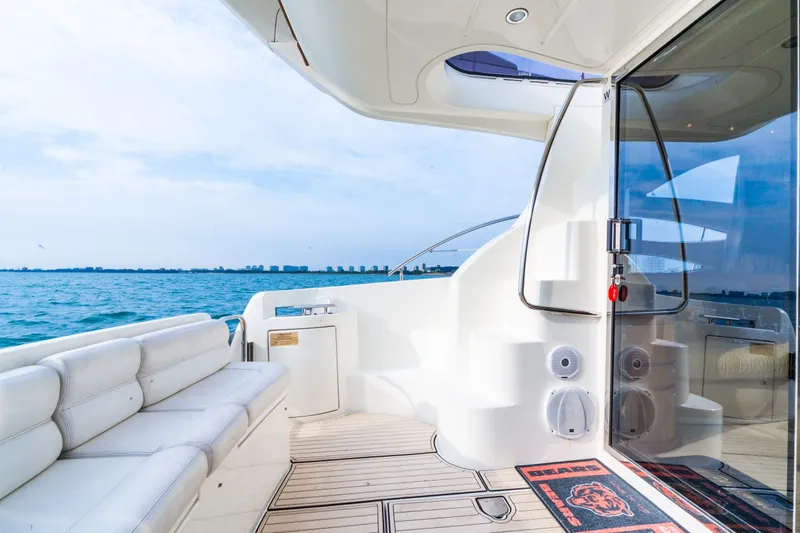 Slide: The Image of Interior of 2004 Azimut 39 Flybridge with helm console. - 33