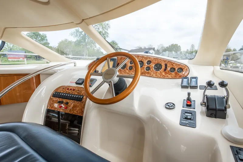 Slide: The Image of Interior view of 2004 Azimut 39 Flybridge helm. - 38