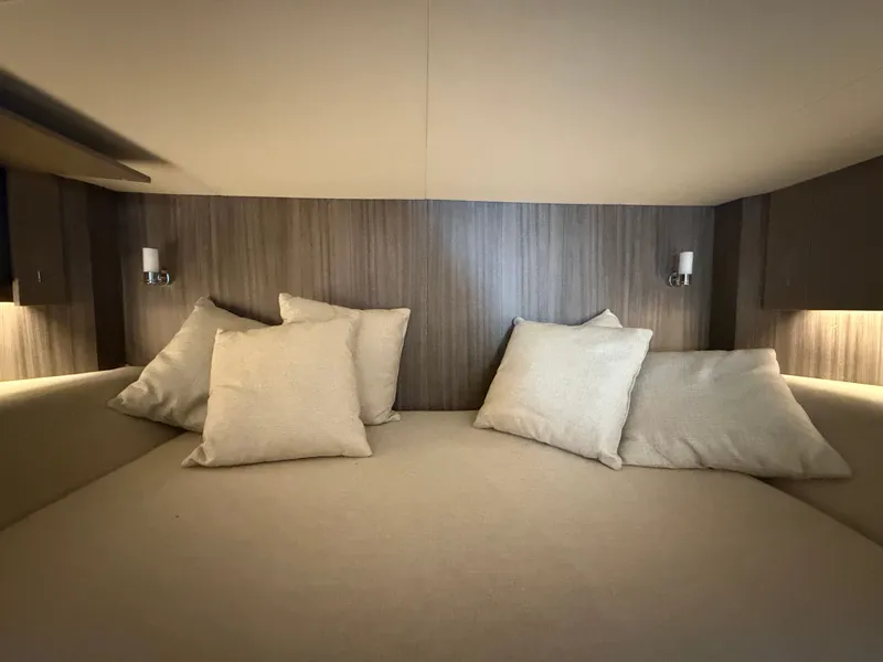 Slide: The Image of Interior of 2020 Sea Ray SLX 400 Outboard with sofa and table. - 46