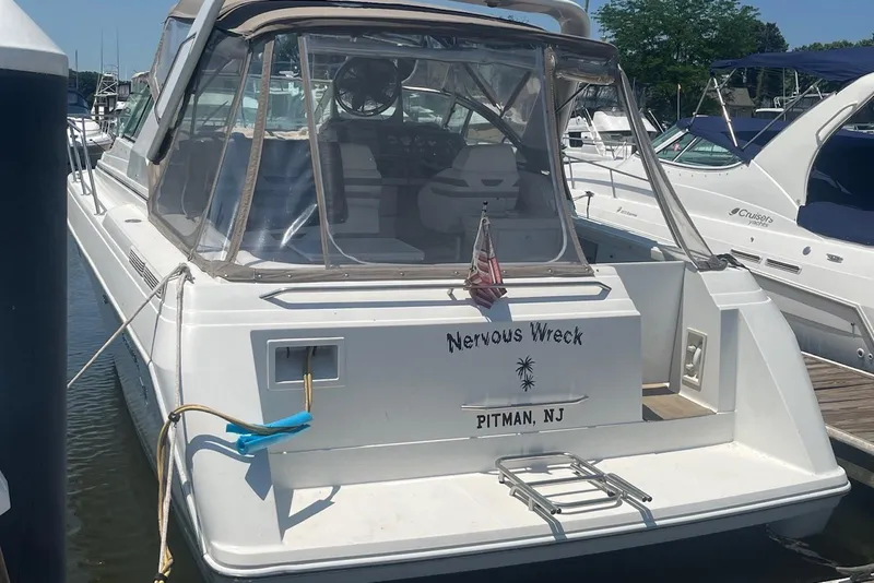 Slide: The Image of 2000 Formula 34 Performance Cruiser docked, named "Nervous Wreck," in Pitman, NJ marina. - 1