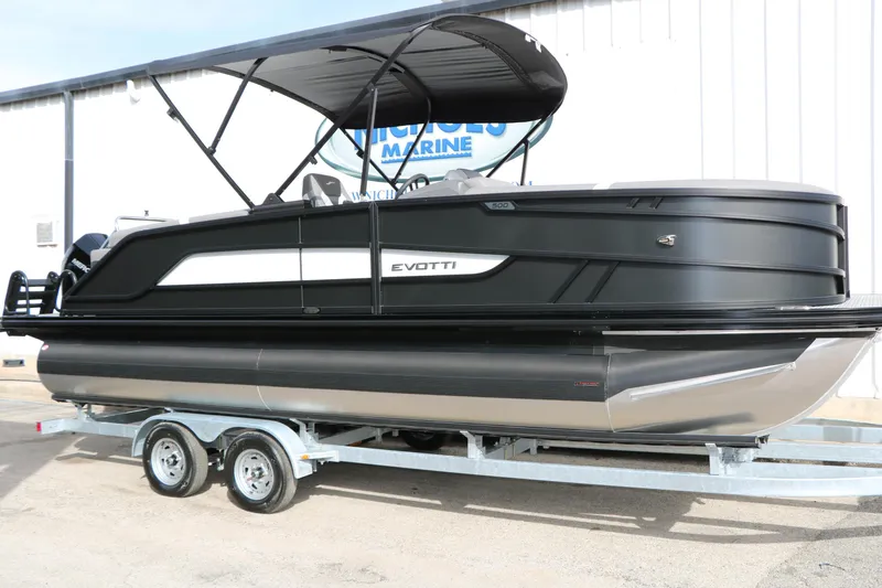 The Image of 2026 Evotti 521QL pontoon boat on trailer, sleek black design, outdoor display. - 0